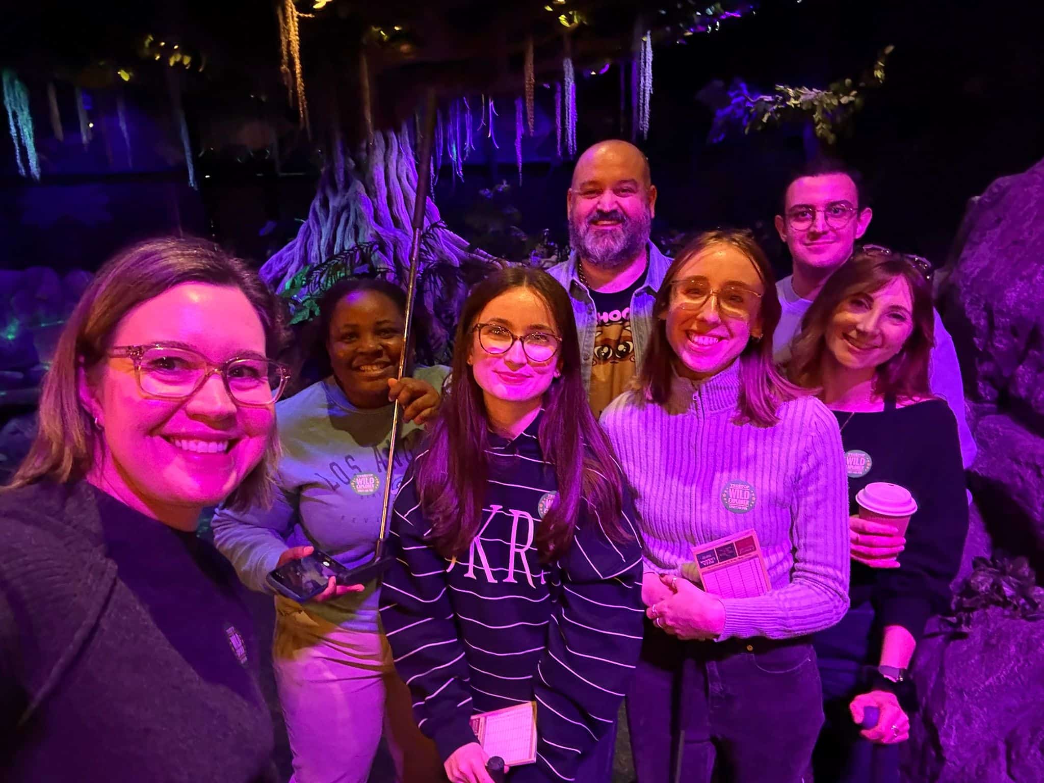 Michelle and Mike's Research groups posing at adventure Golf